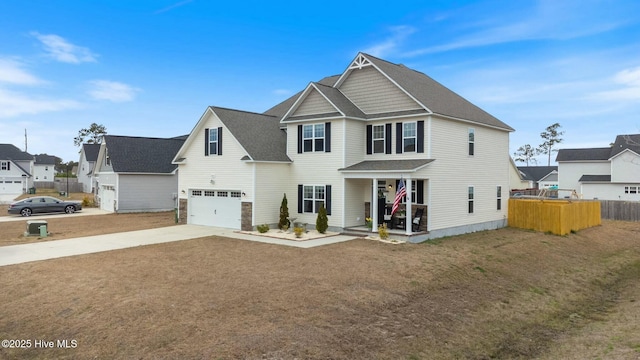603 Coral Reef Ct, Sneads Ferry, NC 28460 - view of front of property featuring fence, a residential view, an attached garage, driveway, and a porch