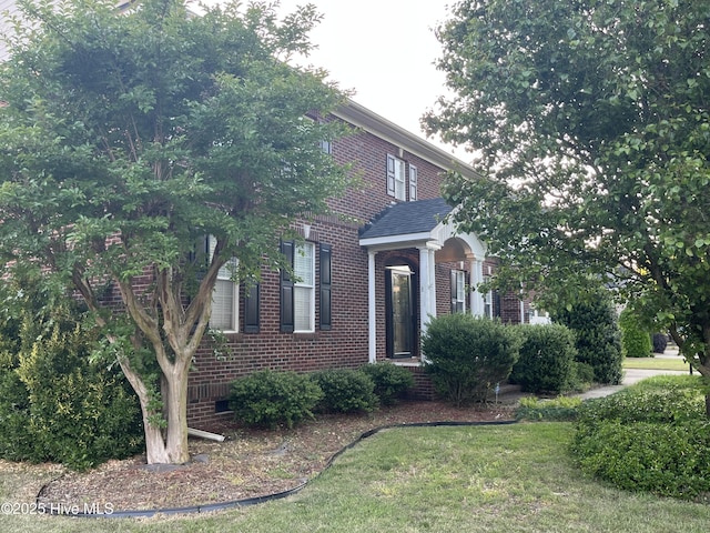 view of front of property with brick siding