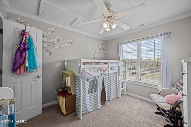 bedroom with crown molding, carpet, a textured ceiling, and visible vents