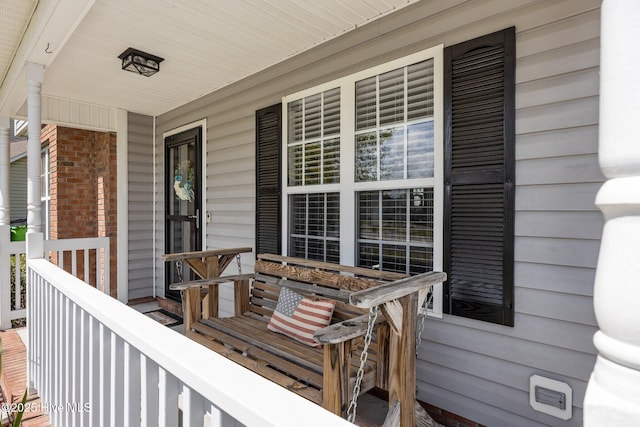 wooden deck with a porch