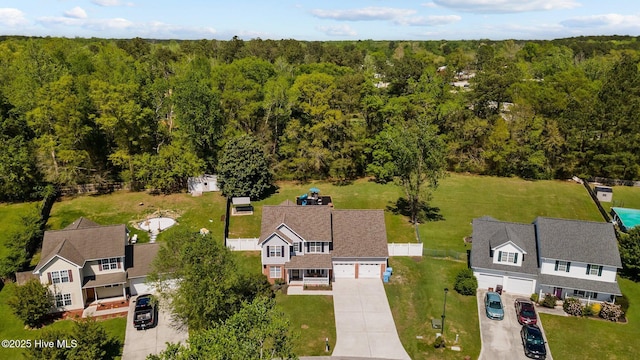 aerial view with a wooded view
