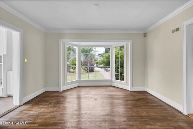 2405 Oleander Dr, Wilmington, NC 28403 - spare room with hardwood / wood-style floors, visible vents, baseboards, and ornamental molding