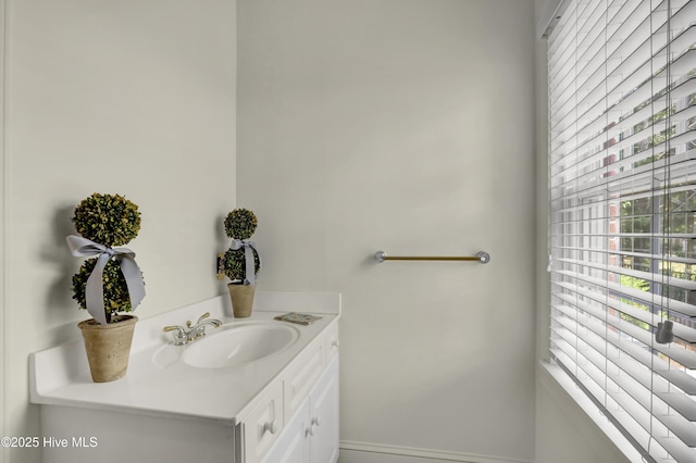 2405 Oleander Dr, Wilmington, NC 28403 - bathroom with baseboards and vanity