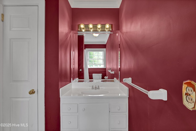 2405 Oleander Dr, Wilmington, NC 28403 - bathroom featuring ornamental molding and vanity