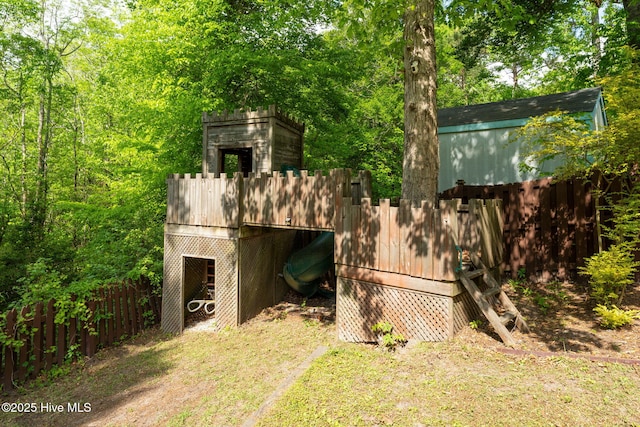 view of outdoor structure with fence