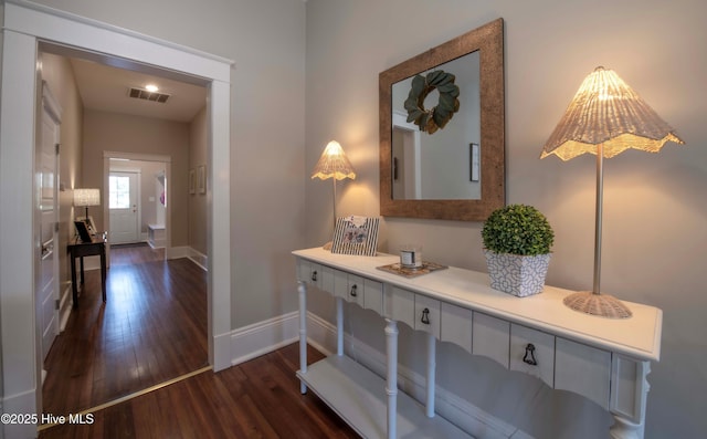 223 N Main St, Wendell, NC 27591 - corridor with baseboards, wood finished floors, and visible vents