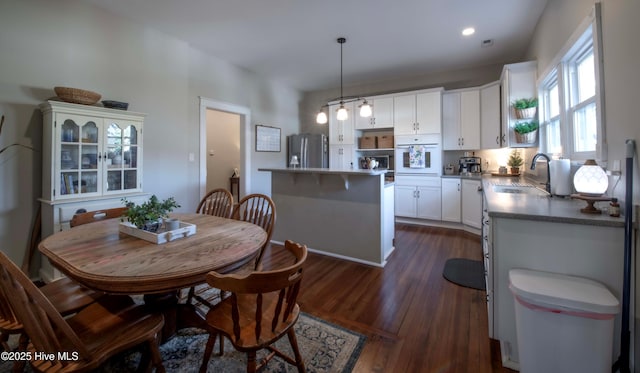223 N Main St, Wendell, NC 27591 - dining space featuring dark wood finished floors