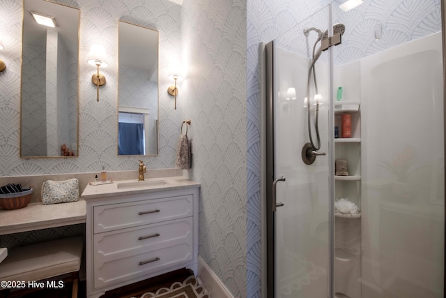 223 N Main St, Wendell, NC 27591 - bathroom featuring wallpapered walls, vanity, and a shower with door