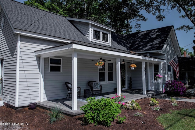223 N Main St, Wendell, NC 27591 - view of front of house featuring ceiling fan, a shingled roof, and covered porch