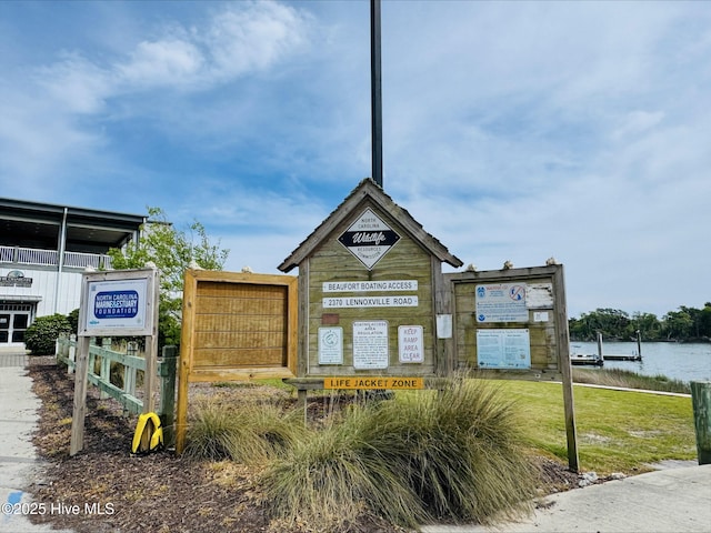 view of property's community with a water view