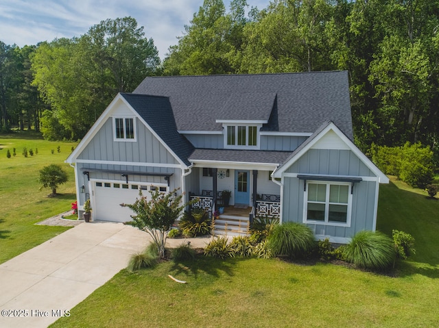 596 W Burton Farm Dr, Minnesott Beach, NC 28510 - view of front of property featuring covered porch, a shingled roof, driveway, and board and batten siding