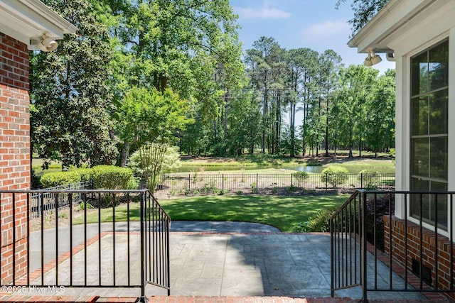118 Legacy Oaks Dr, Wallace, NC 28466 - fenced backyard featuring a patio, a water view, and view of scattered trees