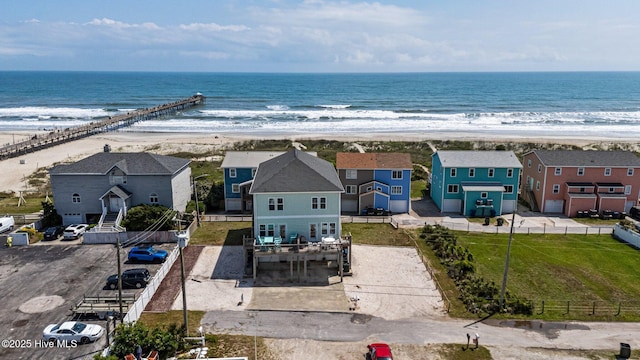 aerial view of waterfront with a beach