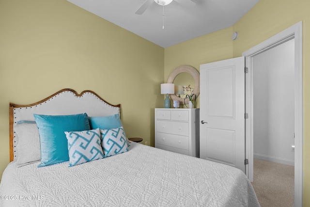 bedroom with carpet floors and a ceiling fan