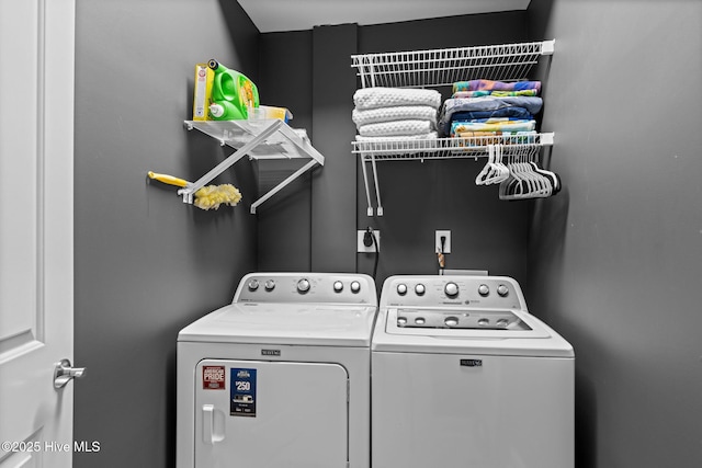 laundry room with washer and clothes dryer