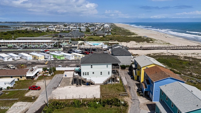 bird's eye view of waterfront with a beach