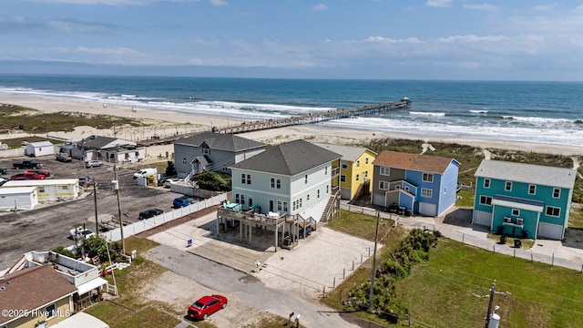 drone / aerial view of waterfront with a beach