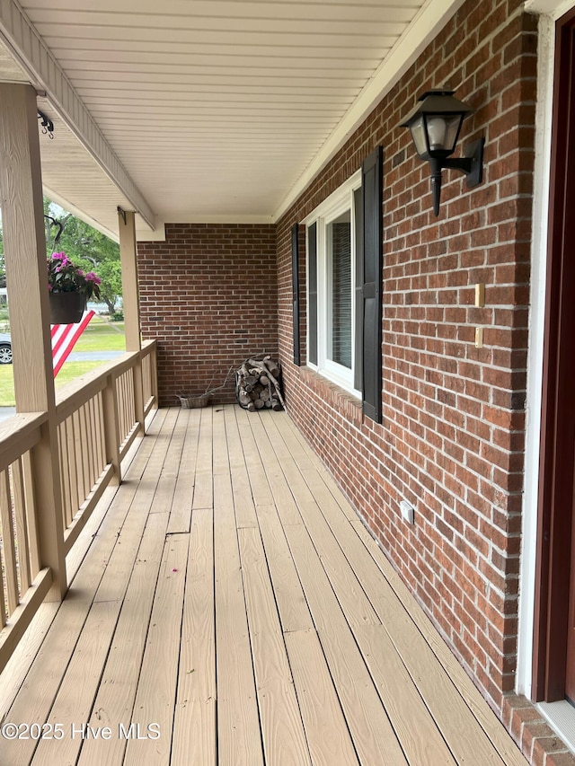 214 Channel View Ct, Cape Carteret, NC 28584 - wooden terrace with covered porch