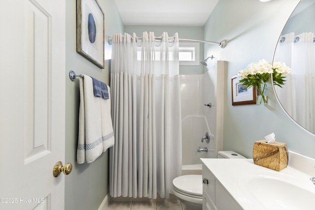 full bathroom featuring vanity, shower / tub combo, tile patterned floors, and toilet