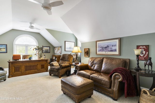 carpeted living area featuring a ceiling fan and vaulted ceiling