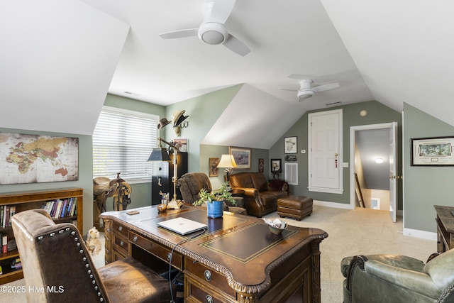 office area with a ceiling fan, baseboards, vaulted ceiling, and carpet
