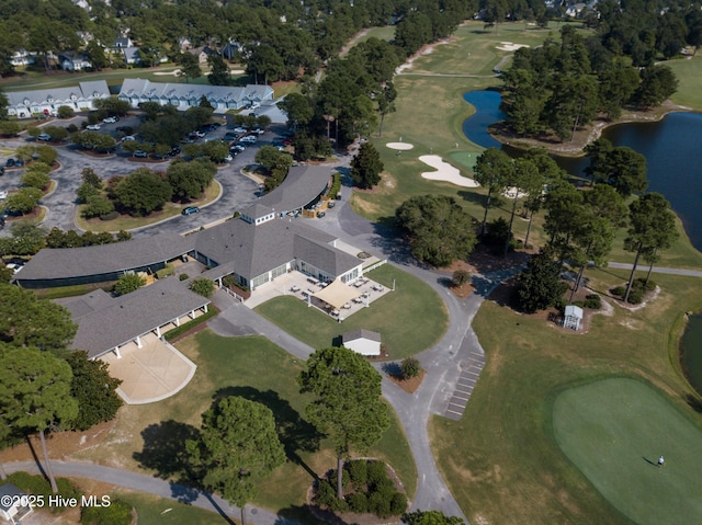 drone / aerial view featuring a water view and golf course view