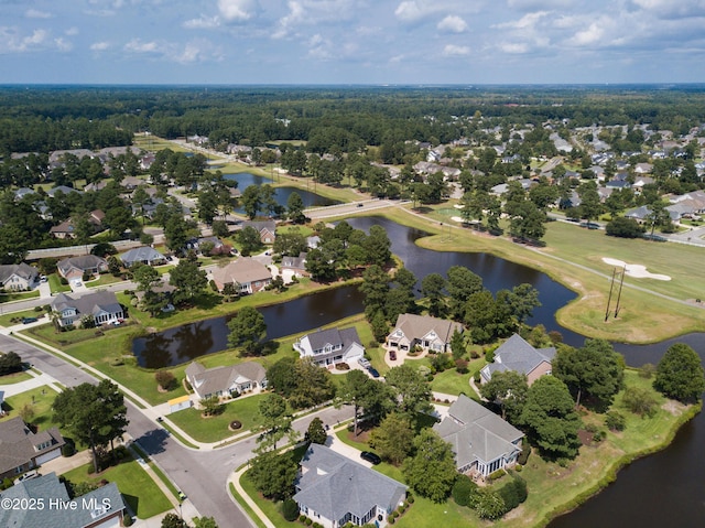 drone / aerial view with a residential view and a water view