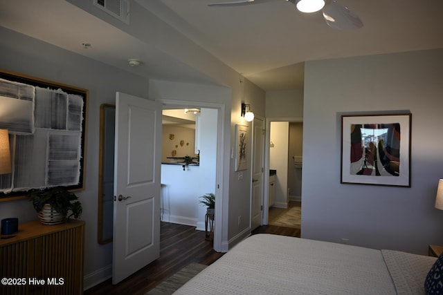 3100 Marsh Grove Ln Unit 3212, Southport, NC 28461 - bedroom with wood finished floors, baseboards, connected bathroom, and a ceiling fan