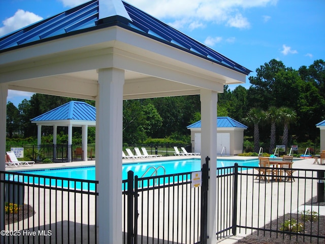 3100 Marsh Grove Ln Unit 3212, Southport, NC 28461 - community pool featuring a gazebo, a patio, and view of wooded area
