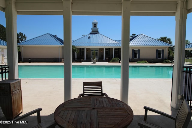 3100 Marsh Grove Ln Unit 3212, Southport, NC 28461 - community pool featuring a patio