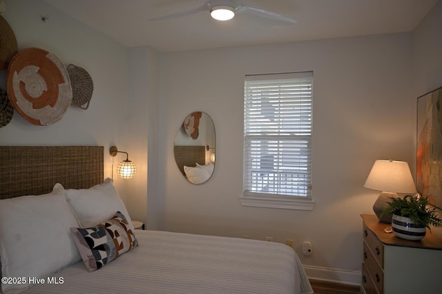 3100 Marsh Grove Ln Unit 3212, Southport, NC 28461 - bedroom with multiple windows, baseboards, and ceiling fan