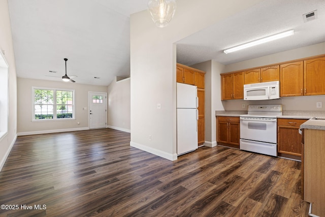 719 Oak Branches Close Close SE, Leland, NC 28451 - kitchen featuring white appliances, dark wood-style floors, light countertops, and open floor plan
