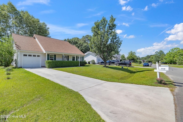 719 Oak Branches Close Close SE, Leland, NC 28451 - single story home with concrete driveway, a front yard, and an attached garage