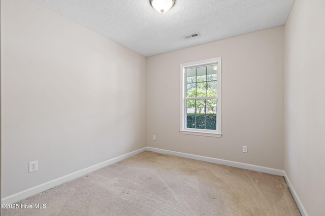 719 Oak Branches Close Close SE, Leland, NC 28451 - carpeted spare room with a textured ceiling and baseboards