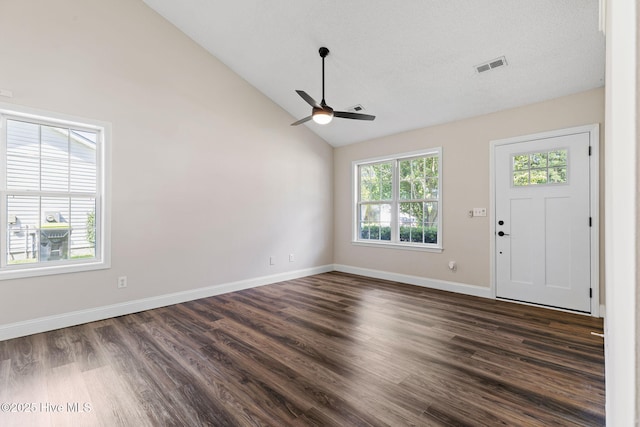 719 Oak Branches Close Close SE, Leland, NC 28451 - entryway featuring ceiling fan, dark wood-style flooring, baseboards, and high vaulted ceiling