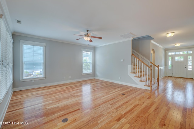 1012 Anchors Bend Way, Wilmington, NC 28411 - interior space featuring visible vents, stairway, arched walkways, and a healthy amount of sunlight