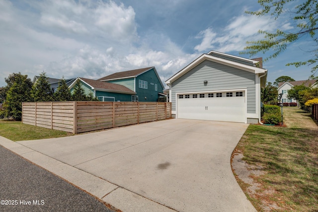 1012 Anchors Bend Way, Wilmington, NC 28411 - exterior space featuring fence, concrete driveway, and a lawn