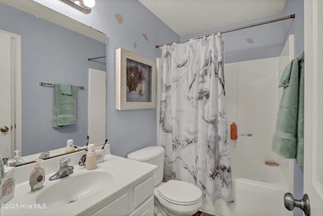 full bath featuring toilet, shower / tub combo with curtain, and vanity