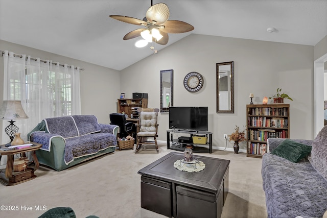 living room featuring light colored carpet, ceiling fan, vaulted ceiling, and baseboards