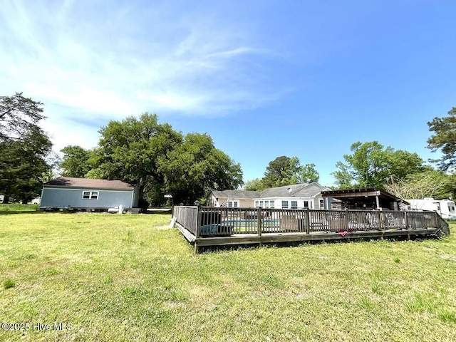 1281 Old Chinquapin Rd, Beulaville, NC 28518 - view of grassy yard featuring a deck