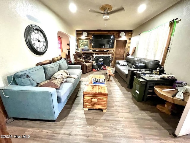 1281 Old Chinquapin Rd, Beulaville, NC 28518 - living room featuring arched walkways and wood finished floors