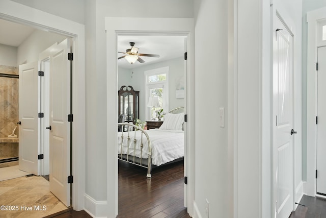 6439 Stopper Ln SW, Ocean Isle Beach, NC 28469 - hall with wood finished floors and baseboards