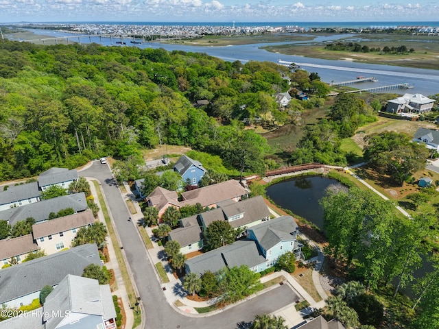 6439 Stopper Ln SW, Ocean Isle Beach, NC 28469 - birds eye view of property with a residential view and a water view