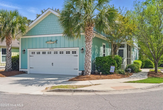 6439 Stopper Ln SW, Ocean Isle Beach, NC 28469 - view of front of house with a garage and driveway