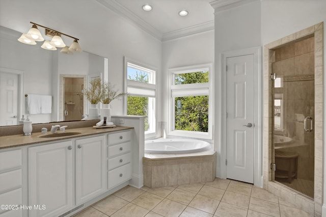 full bathroom with vanity, a bath, a stall shower, ornamental molding, and tile patterned flooring