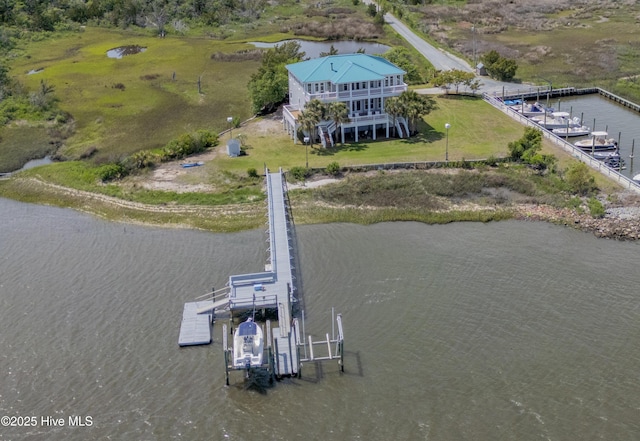 drone / aerial view with a water view