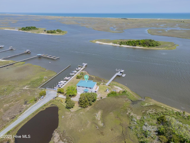 drone / aerial view with a water view