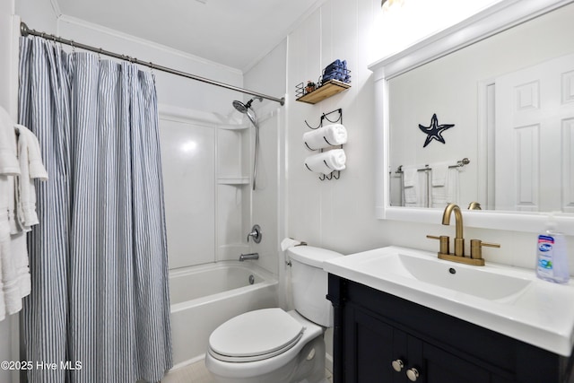 bathroom with vanity, ornamental molding, shower / tub combo, and toilet