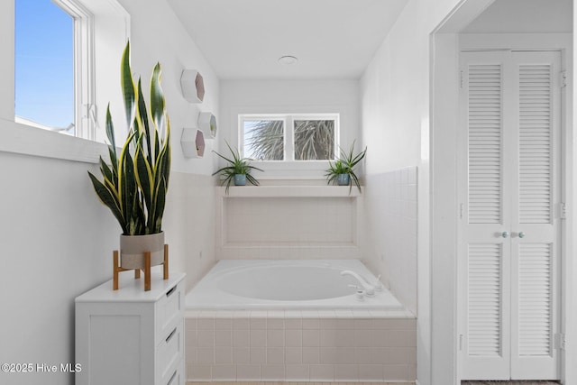 full bathroom featuring a bath