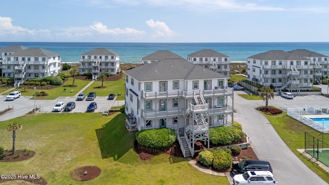 drone / aerial view with a water view